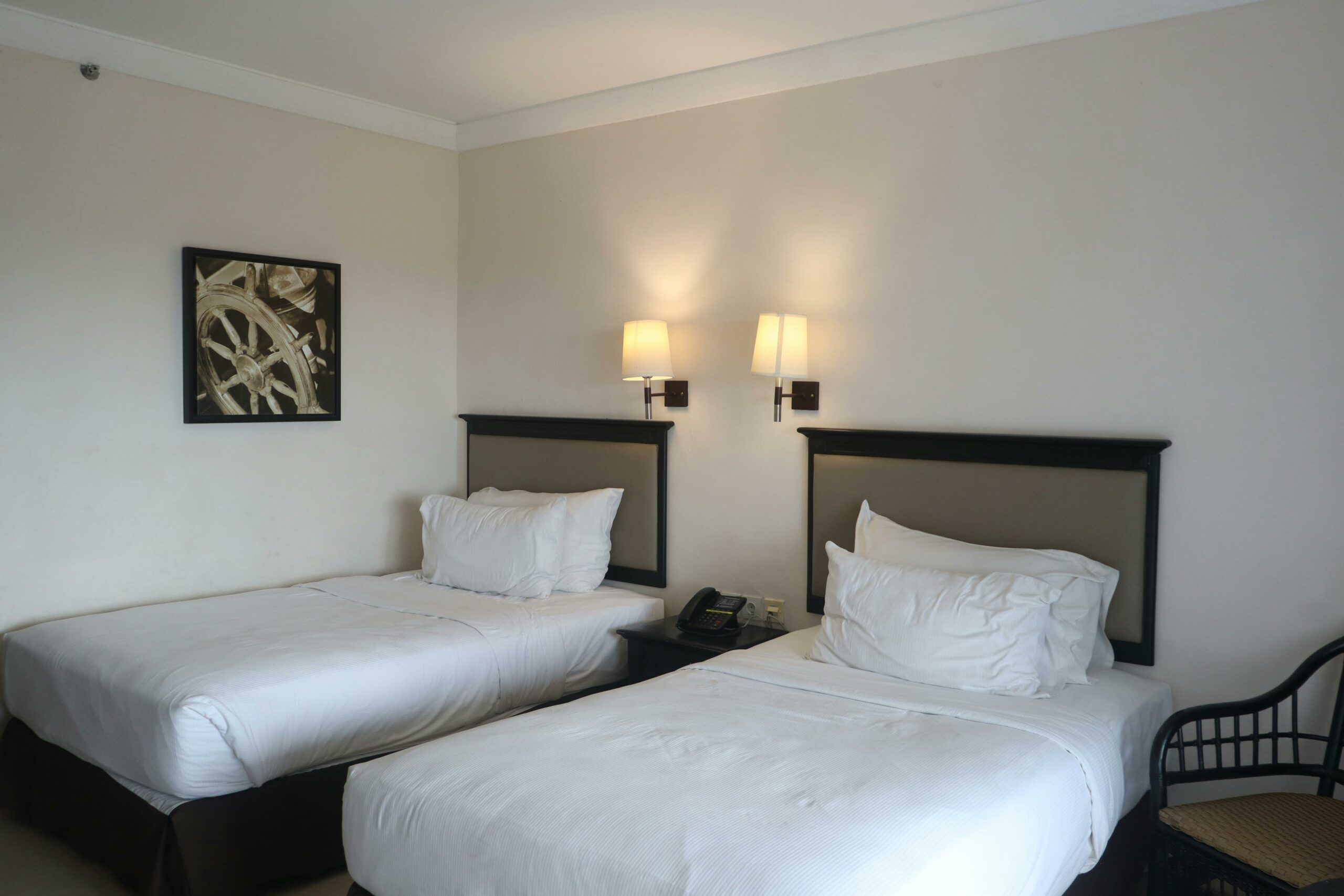 Inviting twin bed room in a North Sulawesi hotel resort. Perfect for a tranquil stay.